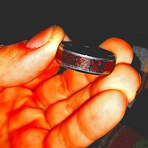 Tungsten til black/red camo engagement ring.